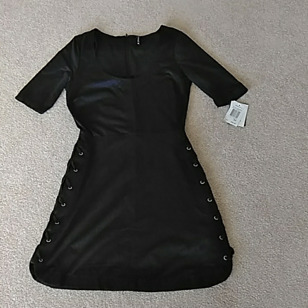 little black dress with tie-ups on the side